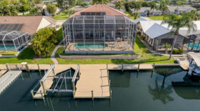 Coral Point by AvantStay Estate w Enclosed Pool Dock Canal Access